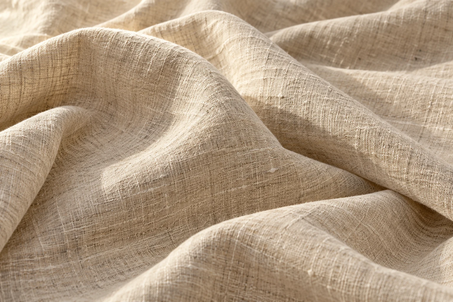 Illustrative close-up of oatmeal linen with a visible natural slub